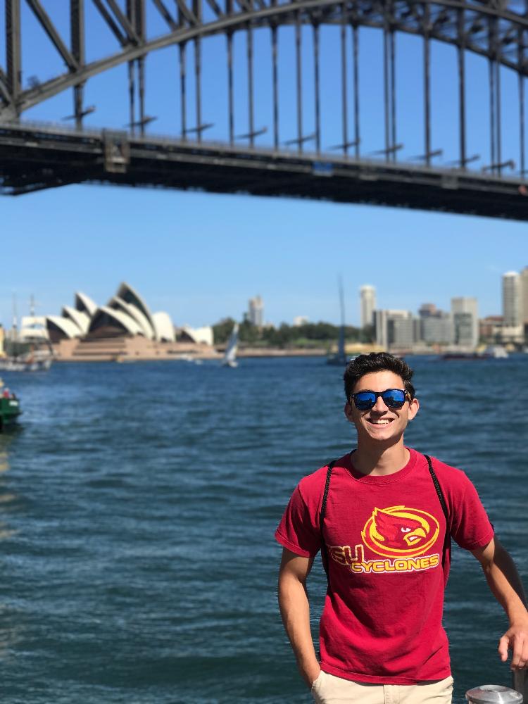 ISU student poses with Sydney's Harbor Bridge.