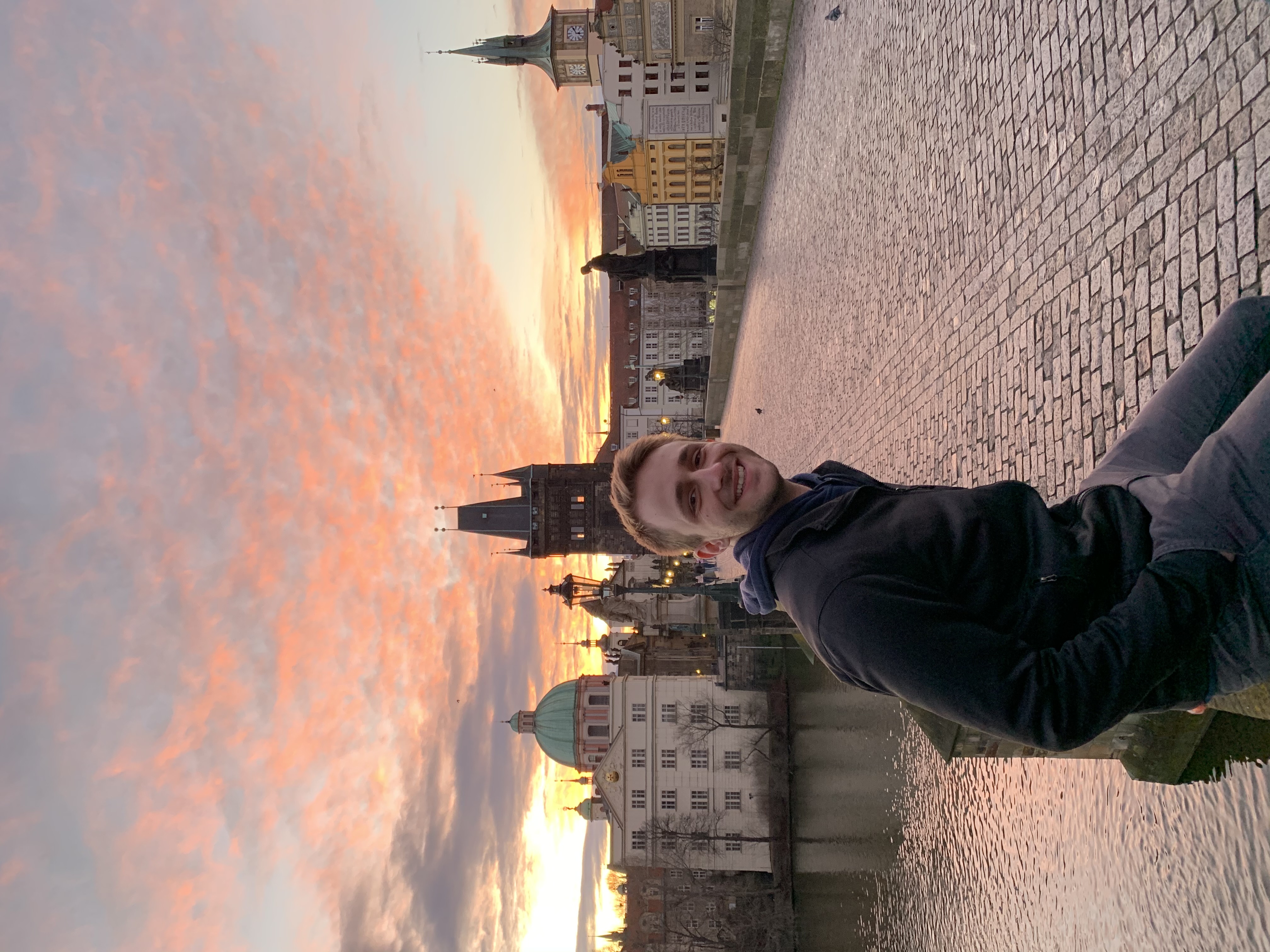 ISU student poses on Charles Bridge.