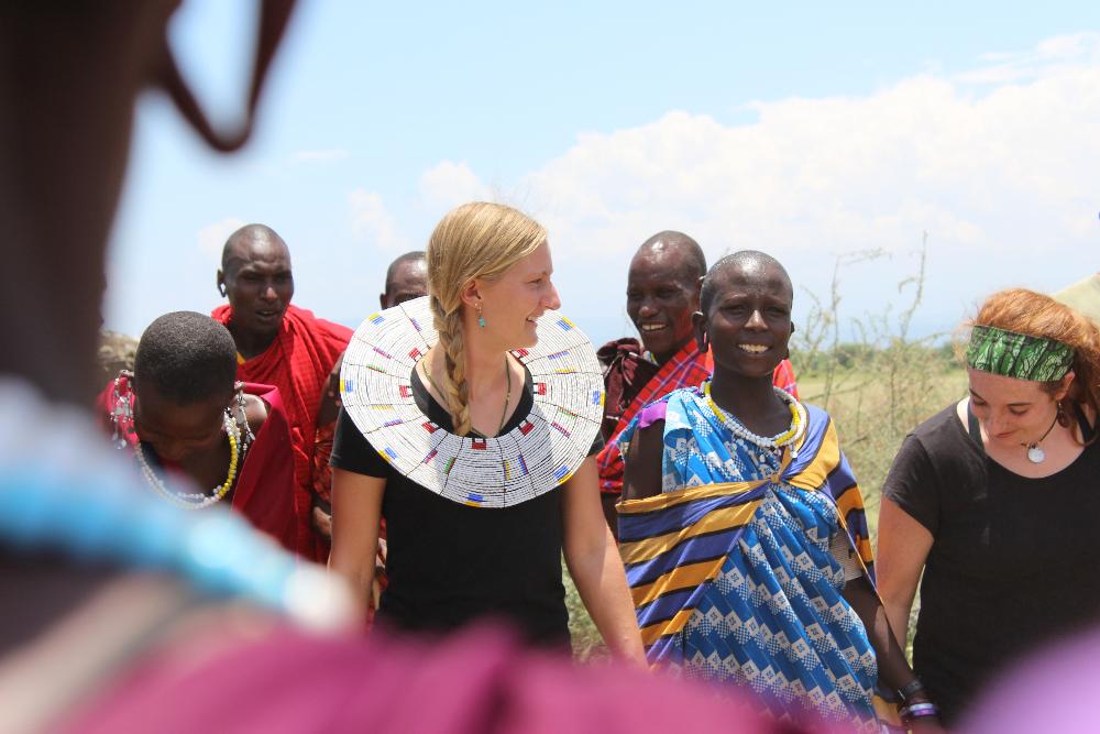 A student interacts with locals in Tanzania